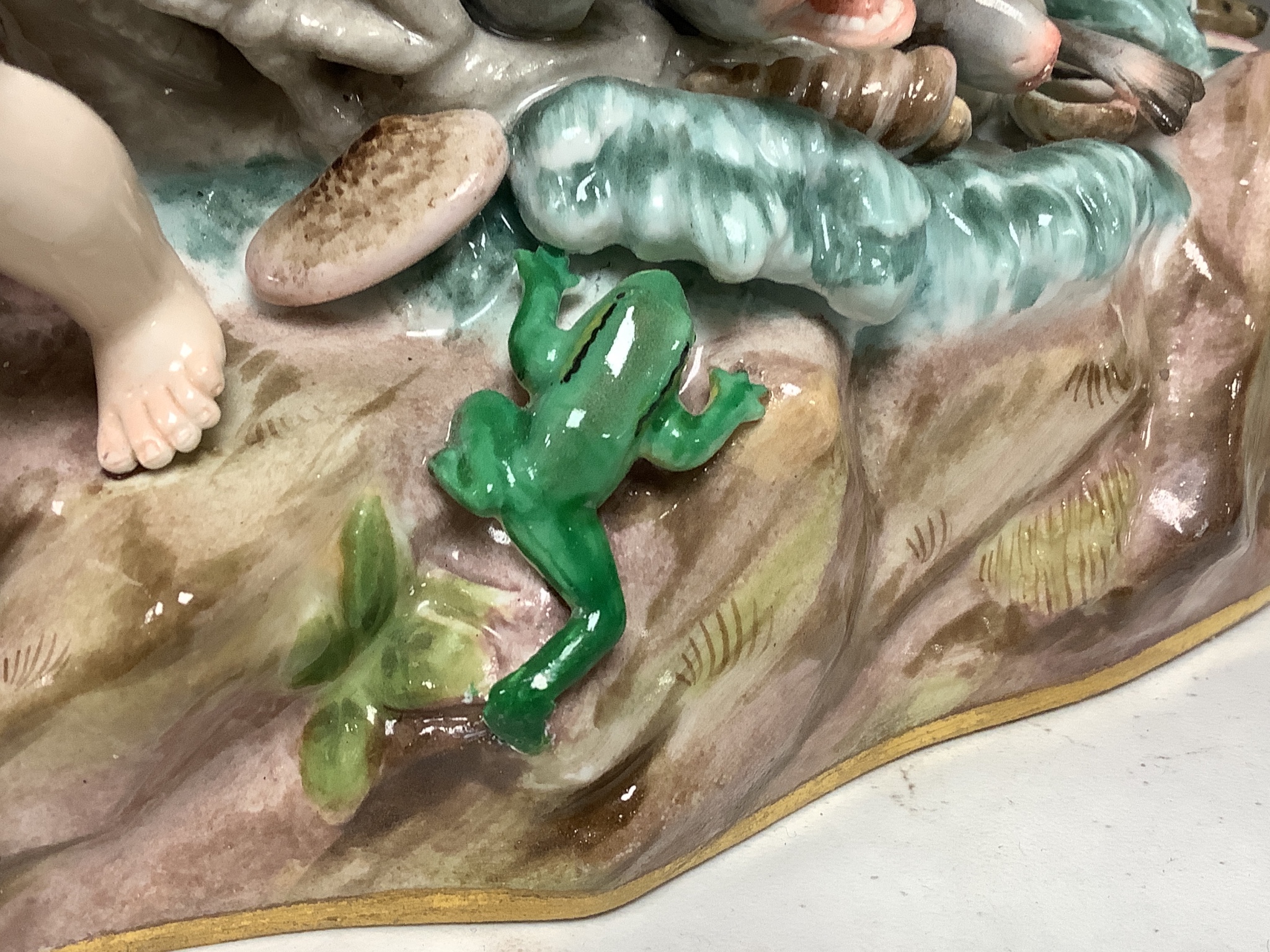 A Meissen group ‘The Capture of the Tritons, 19th century, modelled by Kandler, 31cm high, some restoration